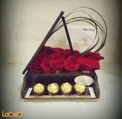Flowers coordinated - piano form from red rose - ferrero rocher