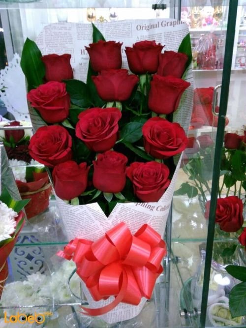 Natural red roses bouquet - green leaves