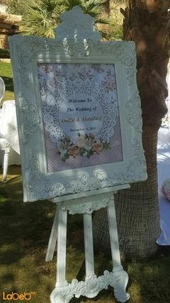 Frame with stand - with natural and artificial flowers