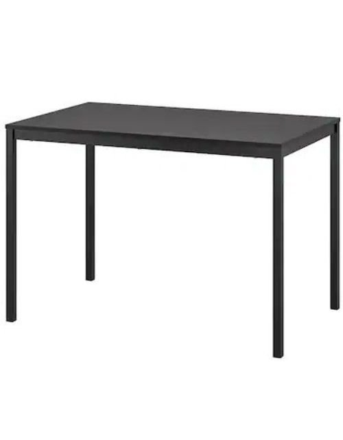 Torendo dining table from IKEA, heat and scratch resistant, black color